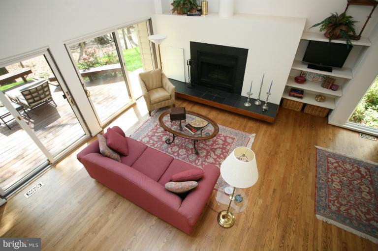 10927 Lawyers Road Reston, VA 20191 - Photo 5 of 30 a living room with furniture and a flat screen tv