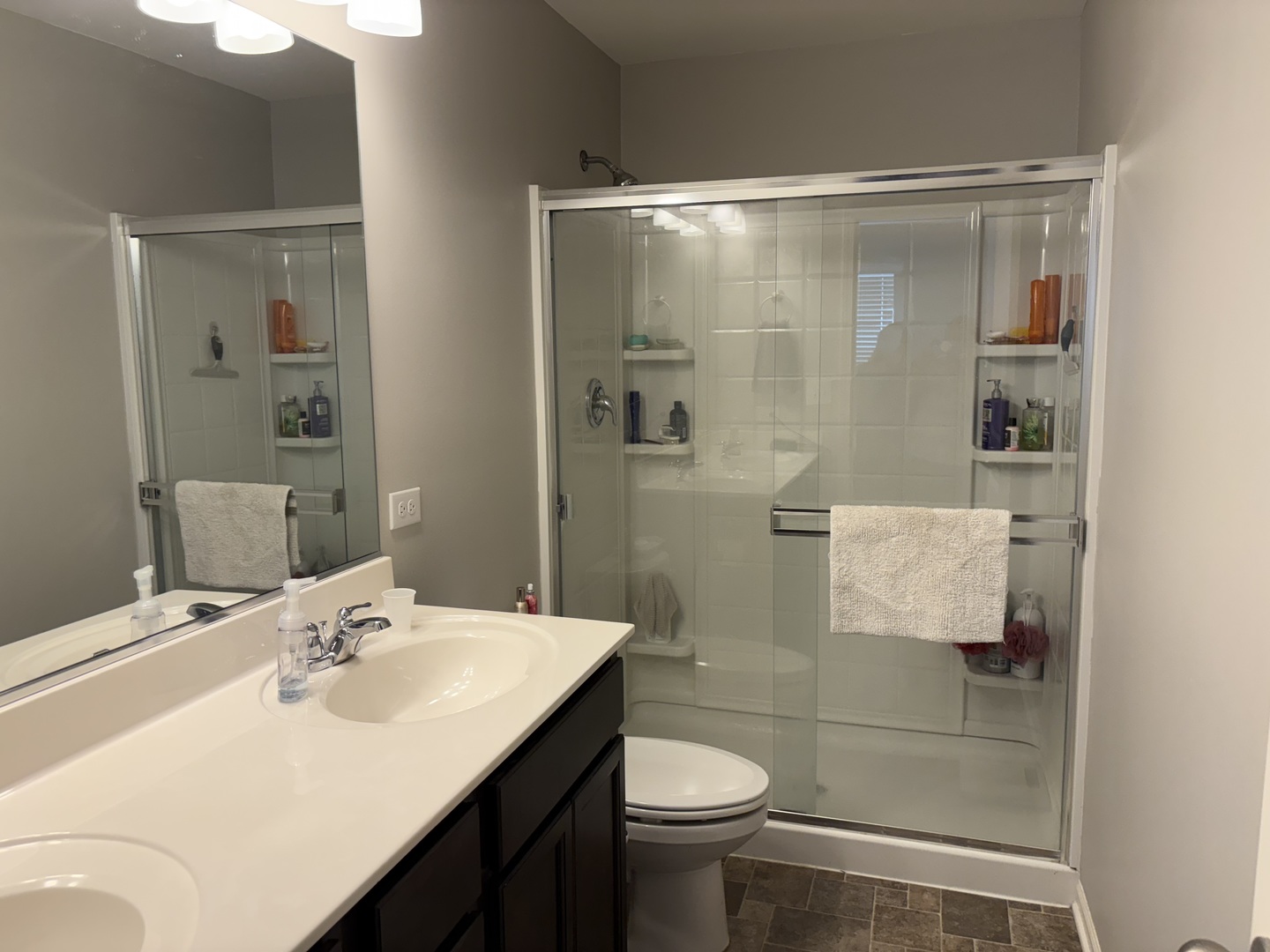 582 Spring Leaf Drive Joliet, IL 60431 - Photo 15 of 25 a bathroom with a sink toilet and shower