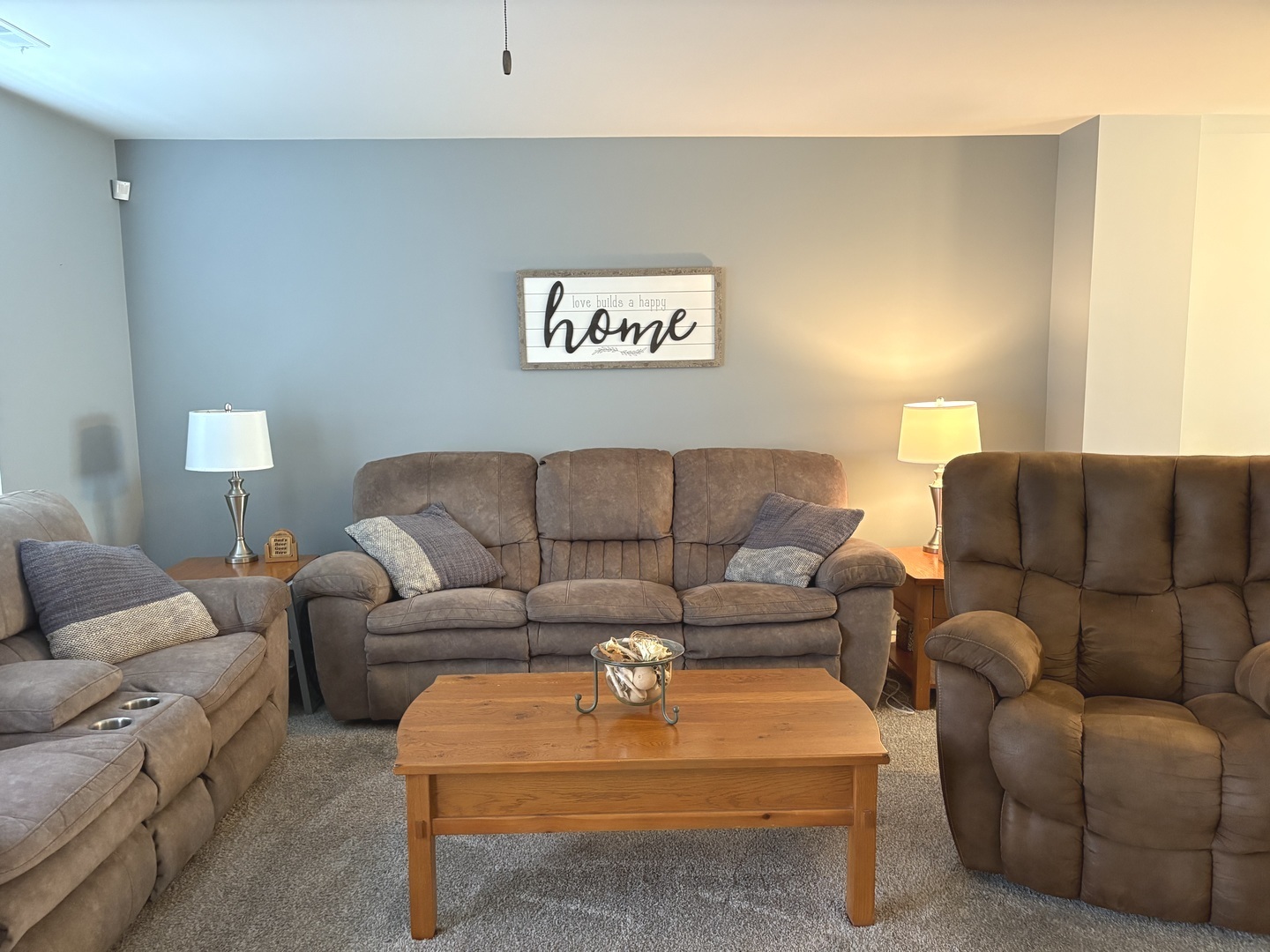 582 Spring Leaf Drive Joliet, IL 60431 - Photo 2 of 25 a living room with furniture and a couch