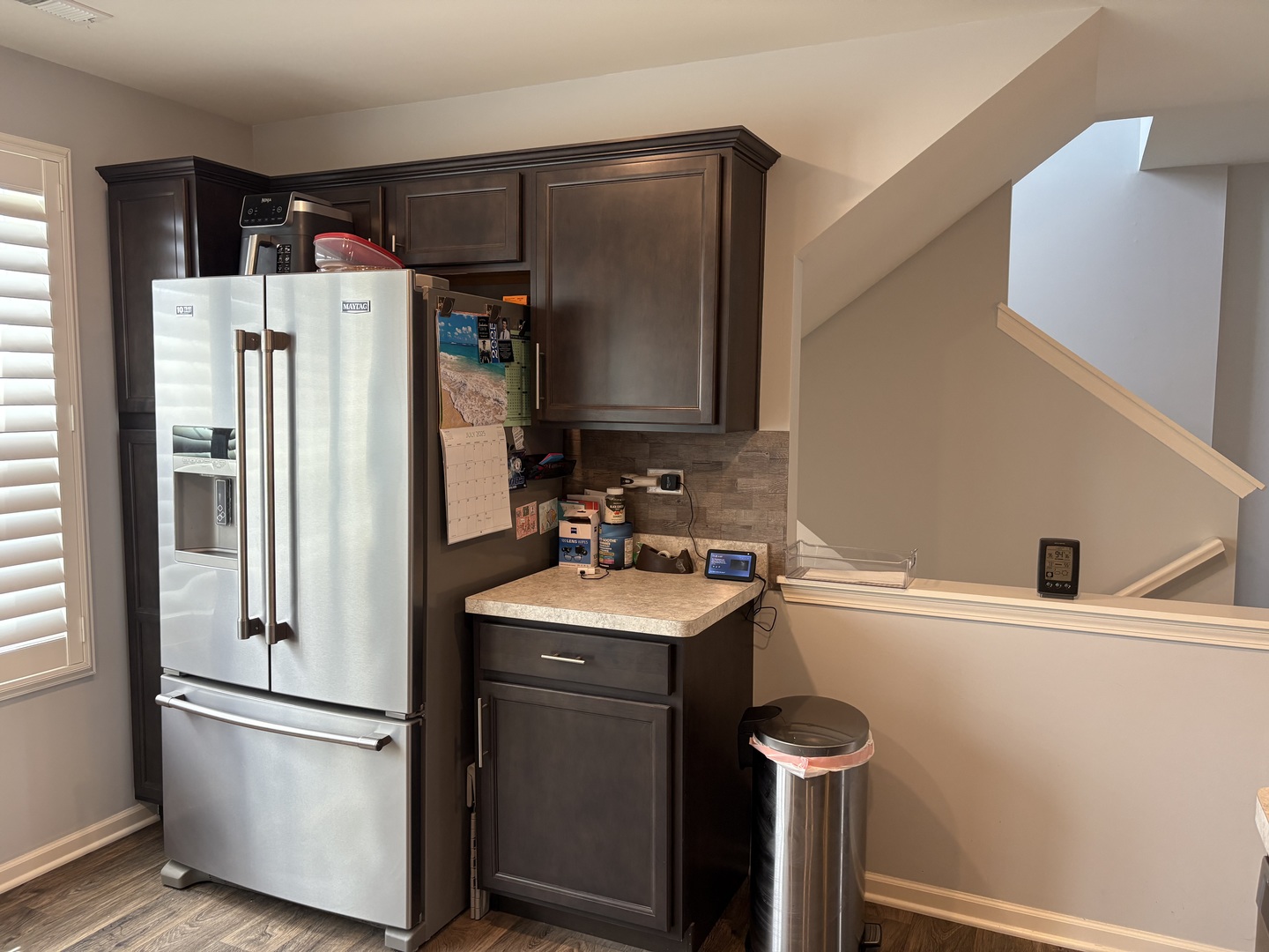 582 Spring Leaf Drive Joliet, IL 60431 - Photo 10 of 25 a kitchen with stainless steel appliances a refrigerator sink and microwave