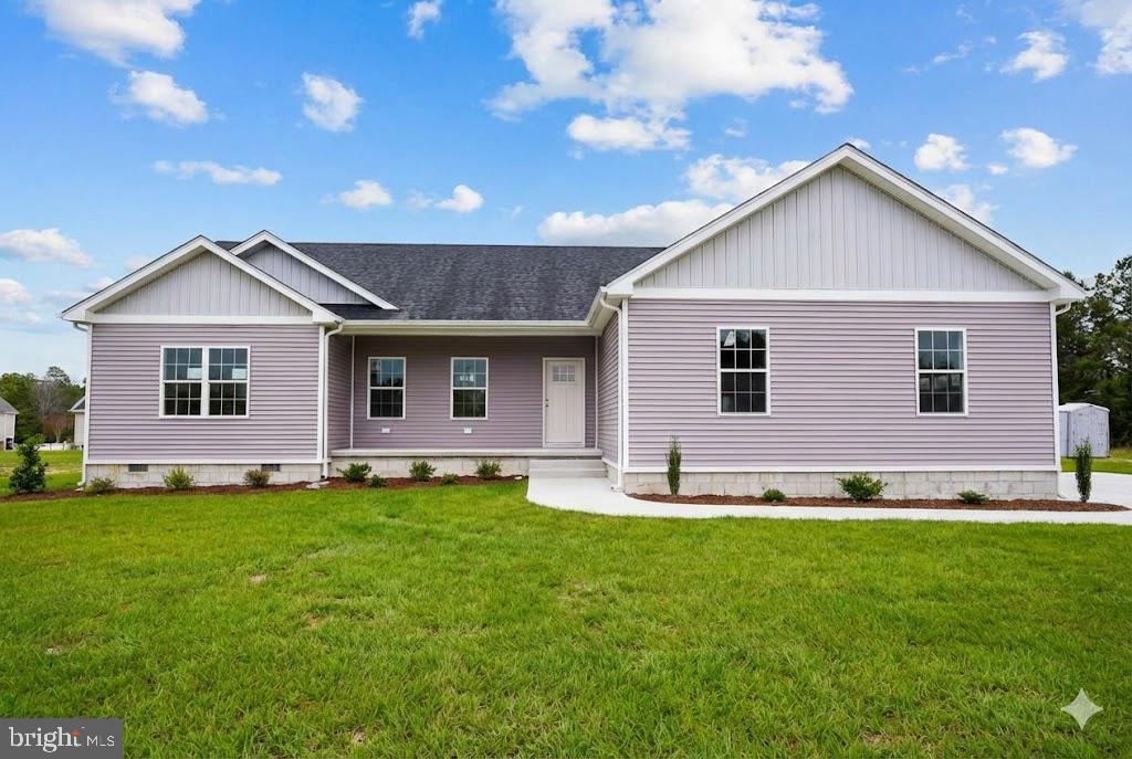 1 Jersey Road Salisbury, MD 21801 - Photo 2 of 19 a front view of a house with a yard and garage