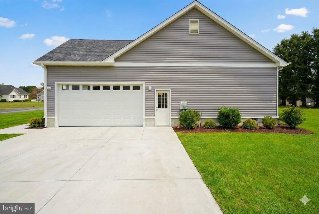 1 Jersey Road Salisbury, MD 21801 - Photo 3 of 19 a front view of a house with a yard and garage