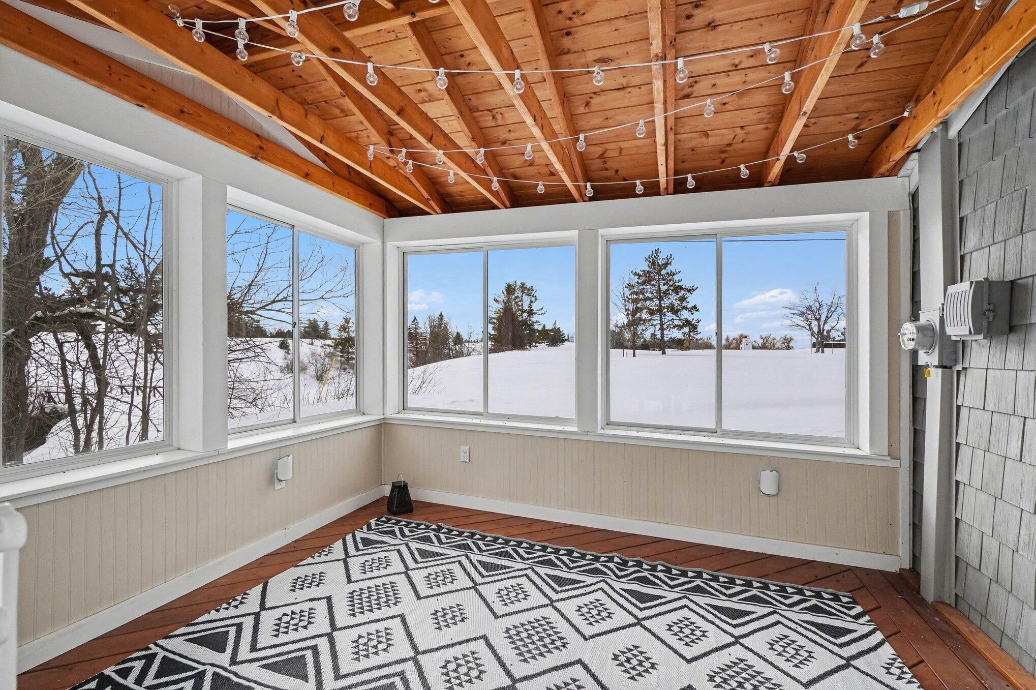 1297 North Old Mackinaw Road Cheboygan, MI 49721 - Photo 17 of 32 Rec summer porch