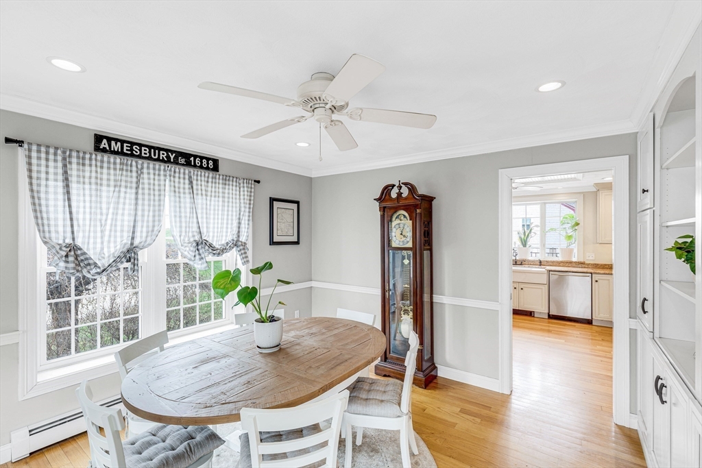 54 Old Merrill Street Amesbury, MA 01913 - Photo 15 of 34 a view of a dining room with furniture window and wooden floor