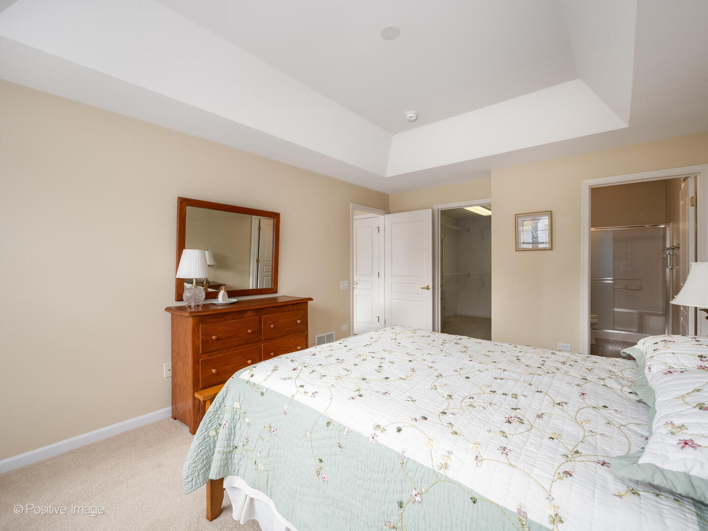 13497 Morgan Way Huntley, IL 60142 - Photo 11 of 19 a bedroom with a bed and a dresser in it