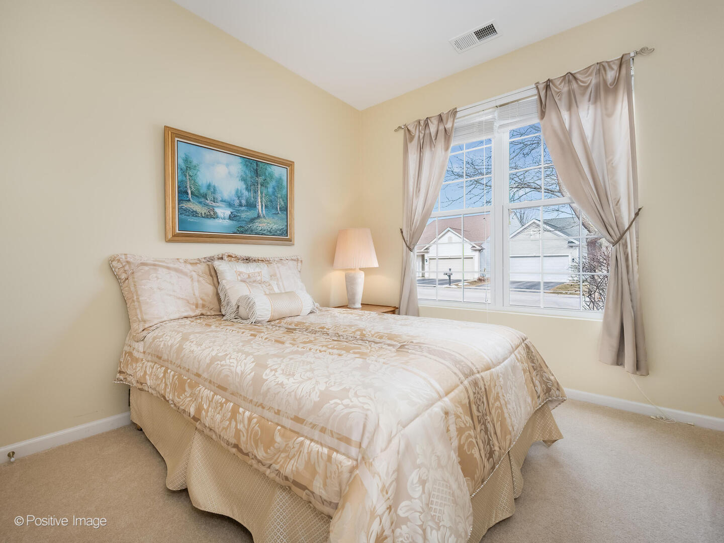 13497 Morgan Way Huntley, IL 60142 - Photo 14 of 19 a bedroom with a bed and a large window