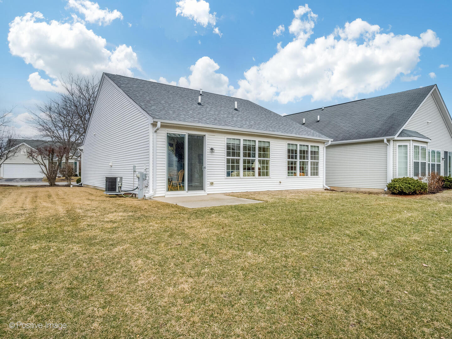13497 Morgan Way Huntley, IL 60142 - Photo 18 of 19 a view of a house with a backyard
