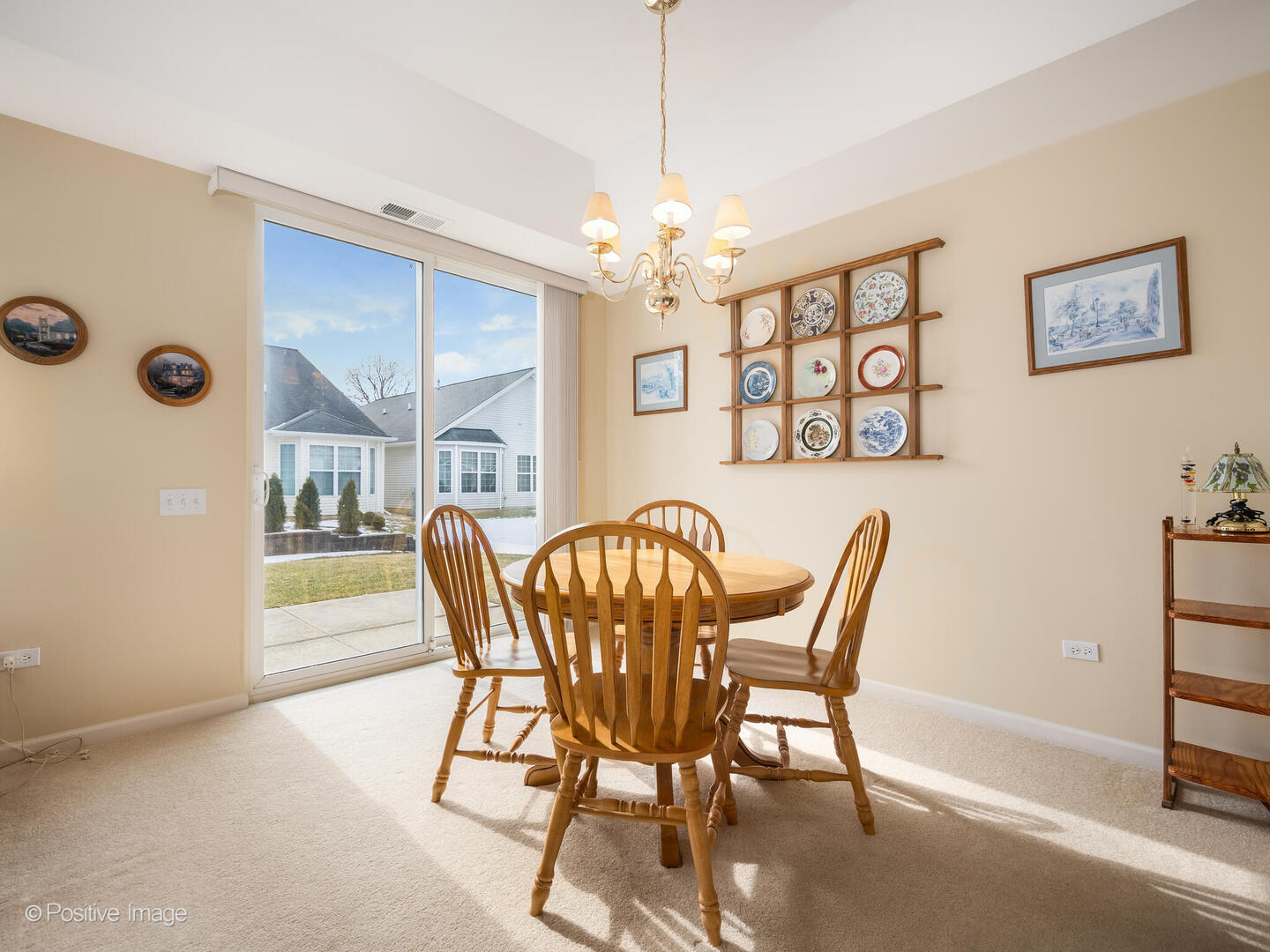 13497 Morgan Way Huntley, IL 60142 - Photo 8 of 19 a dining room with furniture and chandelier