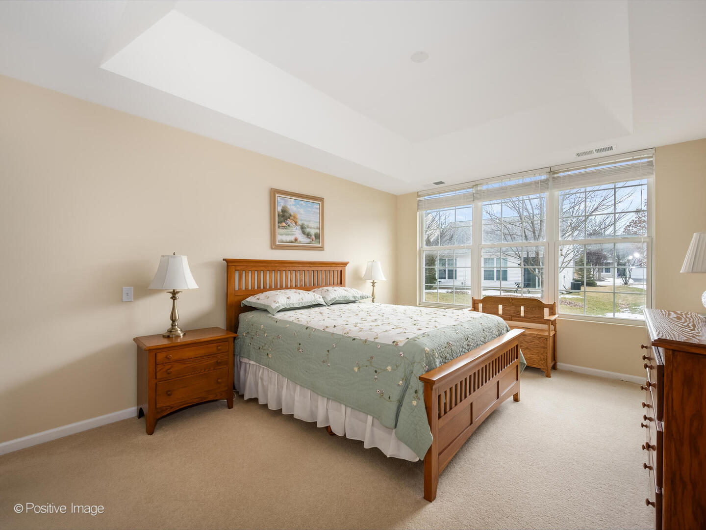 13497 Morgan Way Huntley, IL 60142 - Photo 10 of 19 a bed sitting in a bedroom next to a window