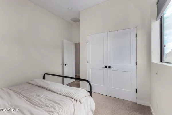 a view of kitchen and utility room with washer and dryer