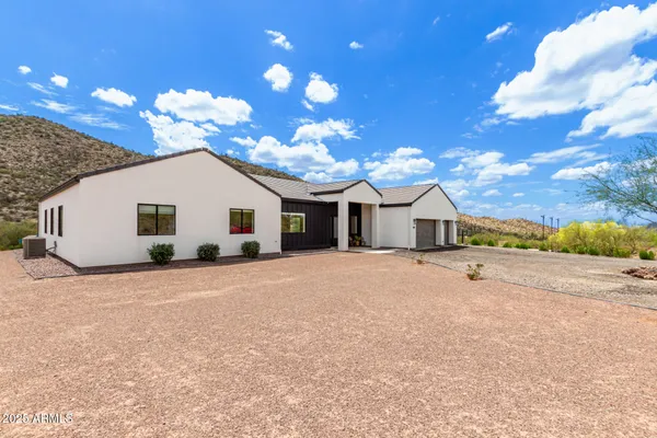 a view of a house with entertaining space