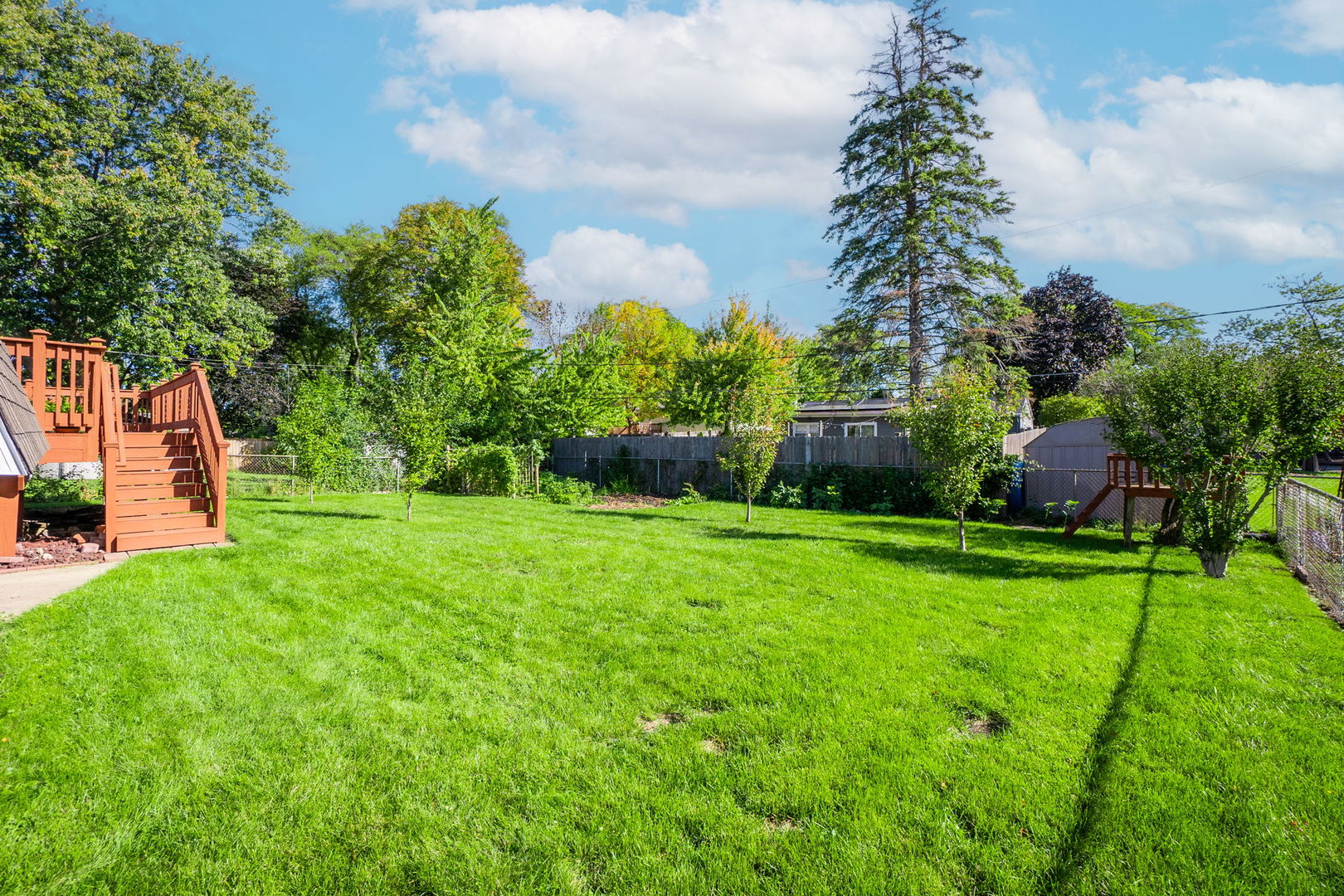 1275 Post Road Aurora, IL 60506 - Photo 24 of 30 a view of yard with swimming pool and green space