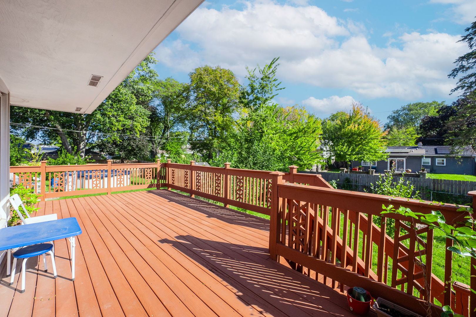 1275 Post Road Aurora, IL 60506 - Photo 29 of 30 a view of balcony with wooden floor and fence