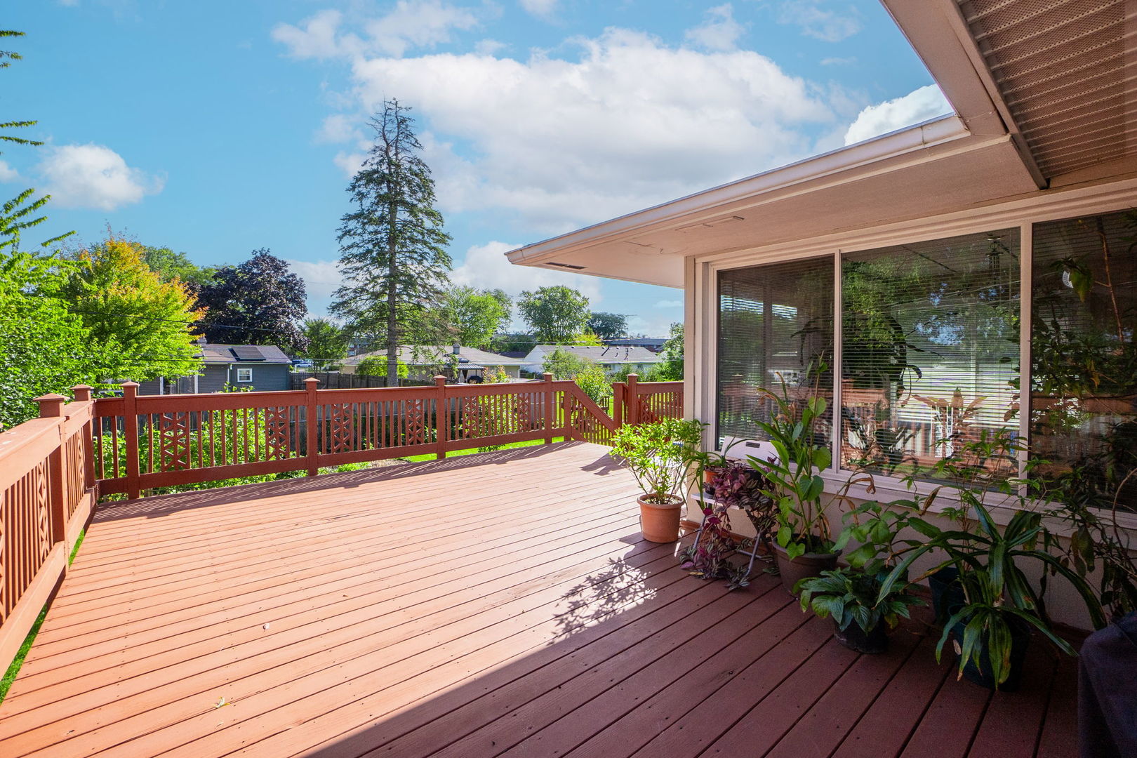 1275 Post Road Aurora, IL 60506 - Photo 30 of 30 a patio with wooden floor table and chairs