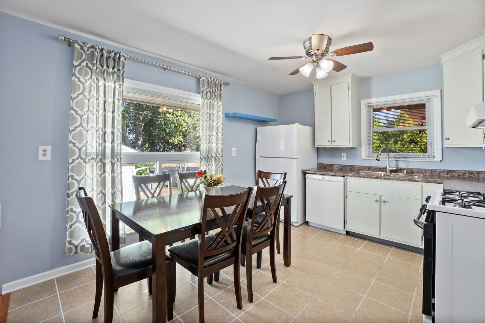 1275 Post Road Aurora, IL 60506 - Photo 9 of 30 a view of a dining room with furniture and a chandelier