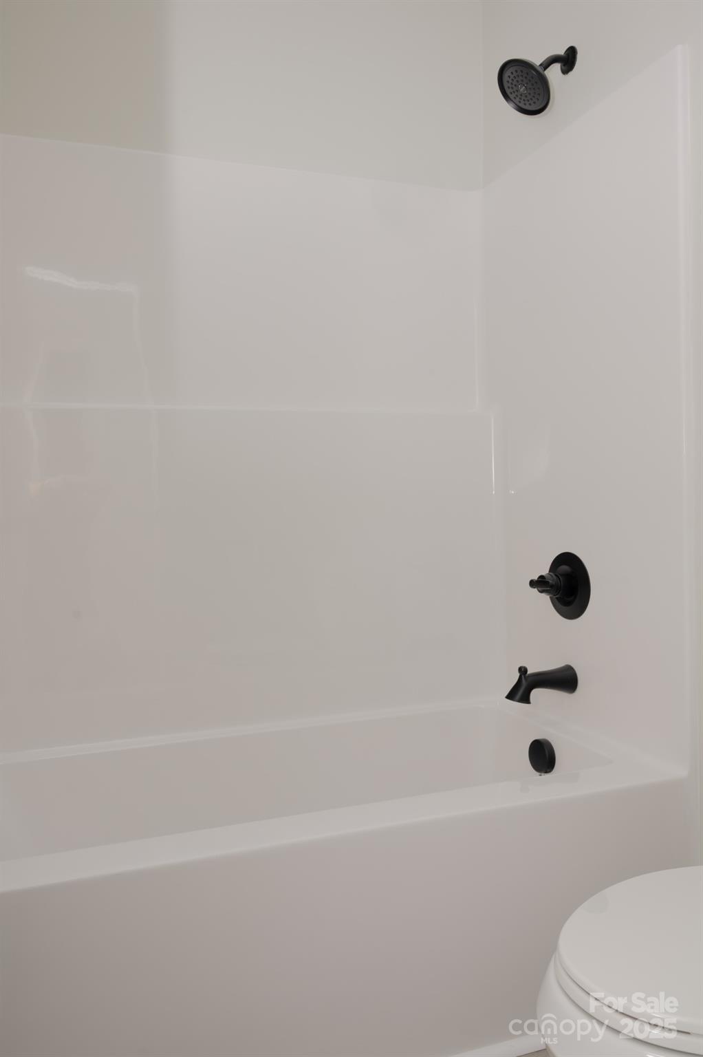 43 Robbins Circle Lexington, NC 27292 - Photo 22 of 28 a bathroom with a shower and a toilet