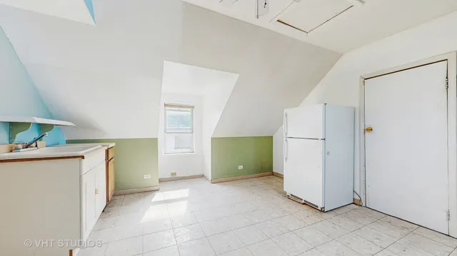 a view of a storage & utility room with closet