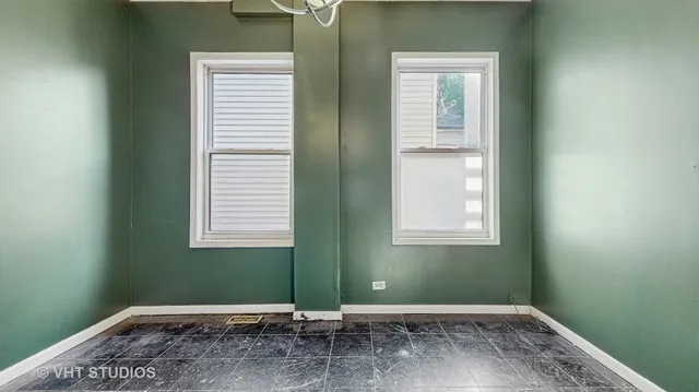 a view of a room that has a window in it