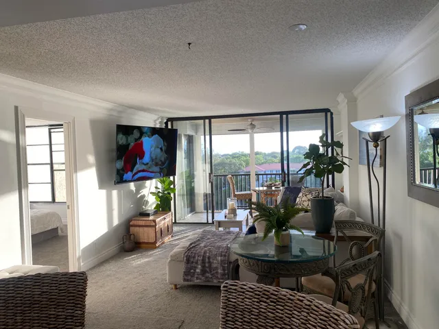 a living room with a couch and a table