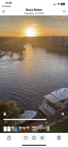 a bathroom with a sink mirror vanity and toilet