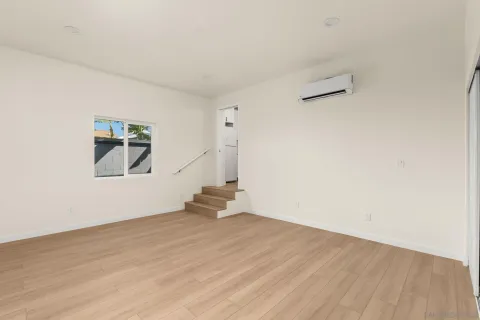 a kitchen with stainless steel appliances granite countertop a stove a refrigerator and a sink