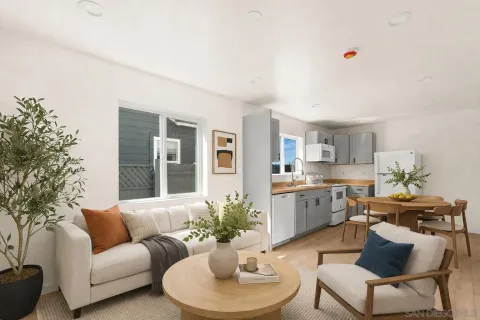 a view of kitchen with granite countertop cabinets and stainless steel appliances