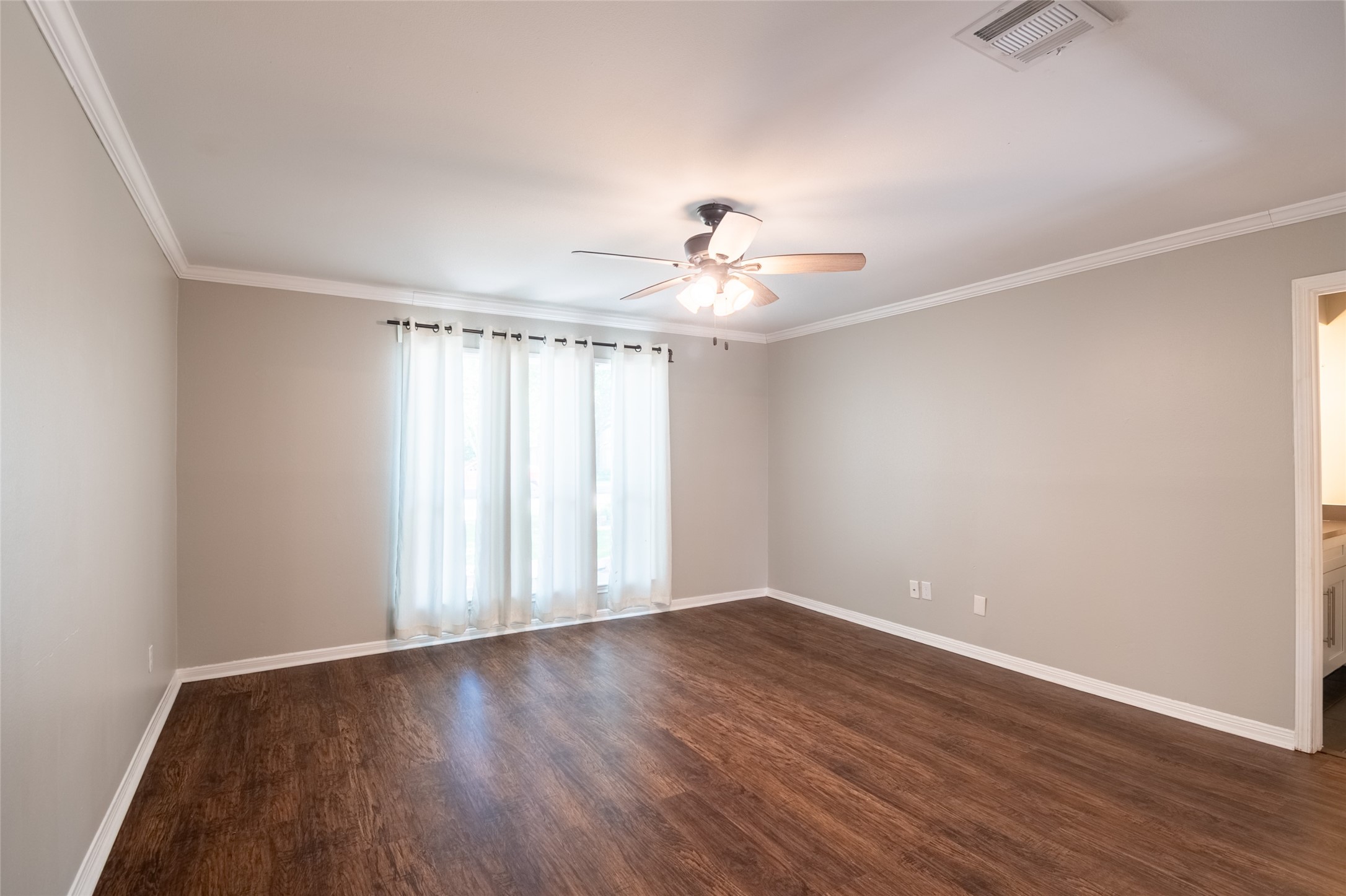 5607 Court Of York Houston, TX 77069 - Photo 23 of 45 wooden floor in an empty room with a window