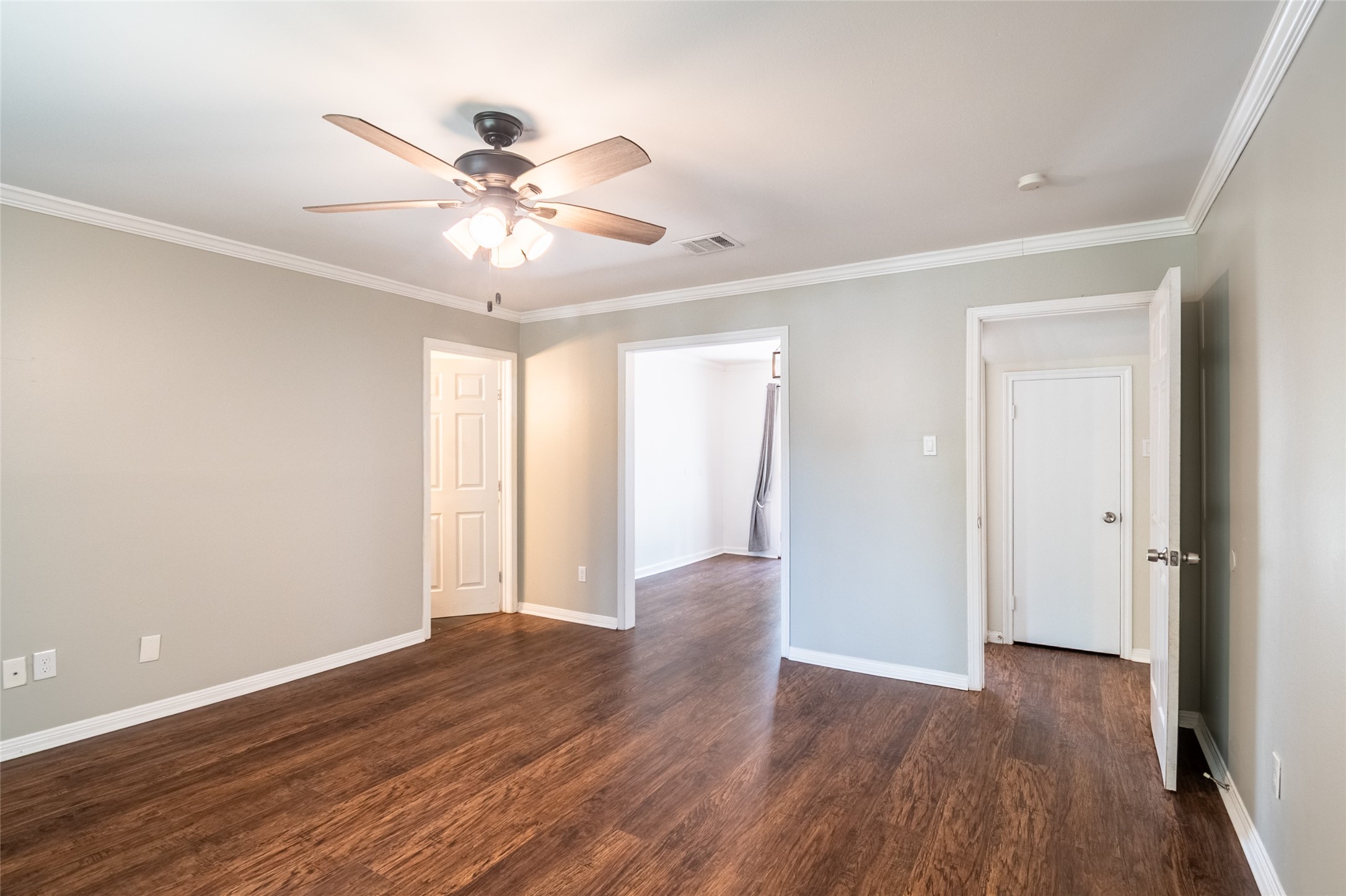 5607 Court Of York Houston, TX 77069 - Photo 24 of 45 a view of an empty room with wooden floor and a window