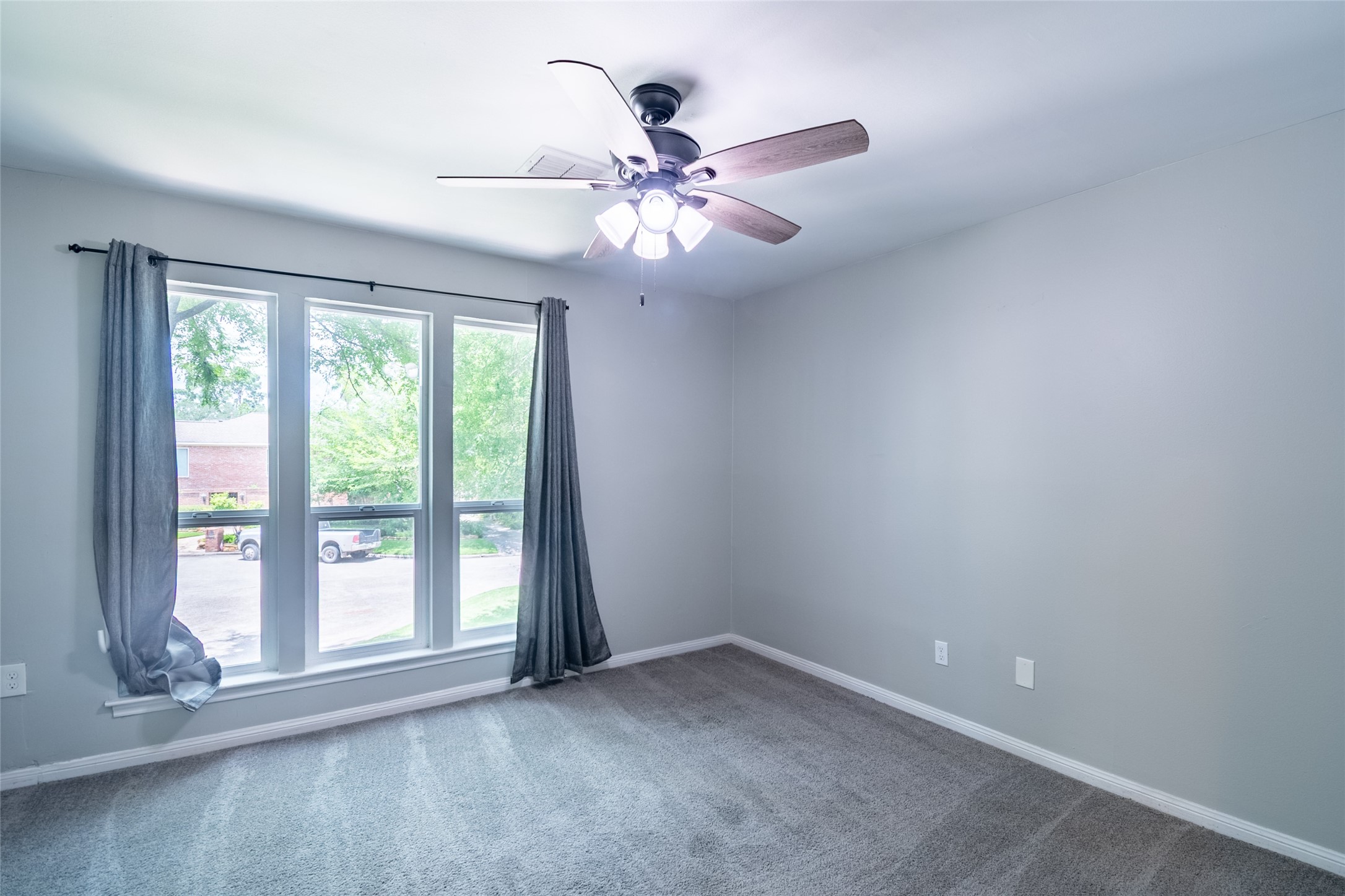 5607 Court Of York Houston, TX 77069 - Photo 32 of 45 wooden floor in an empty room with a window