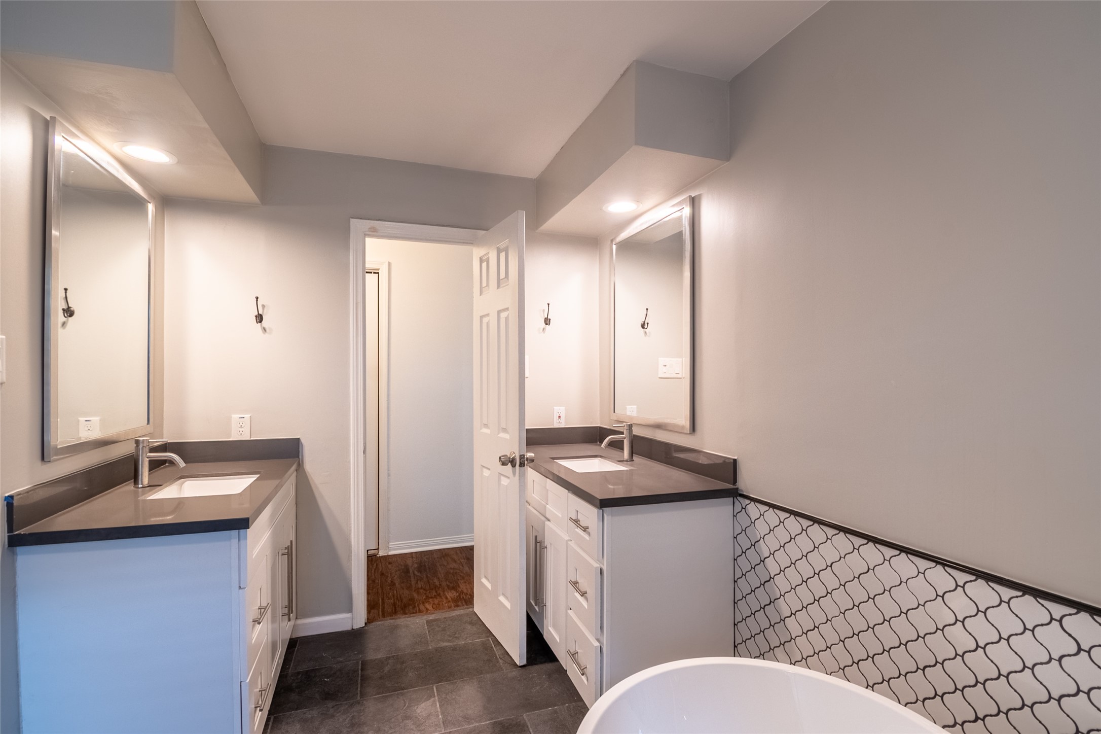 5607 Court Of York Houston, TX 77069 - Photo 39 of 45 a bathroom with a sink a toilet a mirror and shower