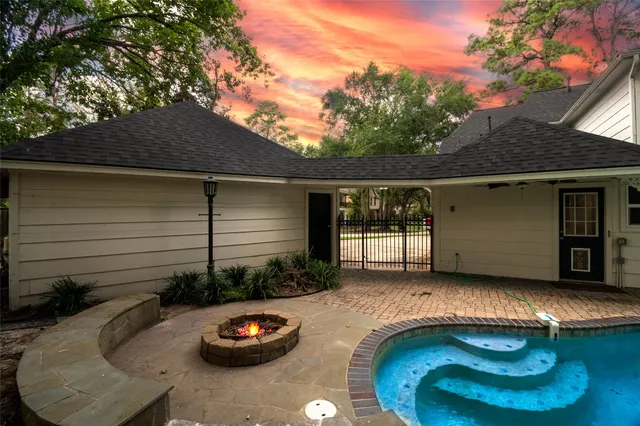 a view of an entryway with wooden floor and door