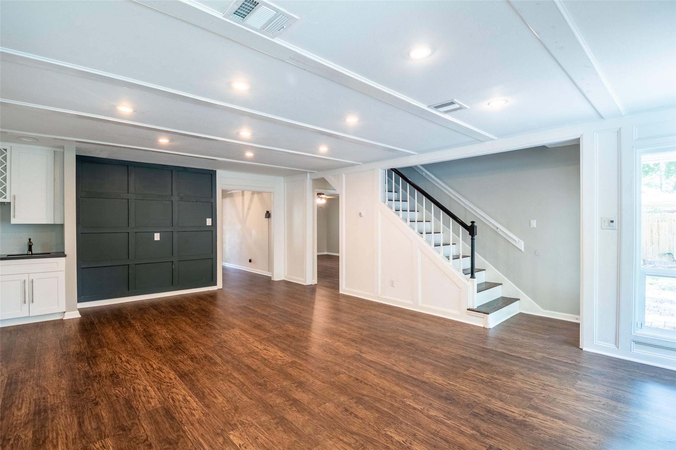 5607 Court Of York Houston, TX 77069 - Photo 10 of 45 a view of an empty room with wooden floor and entryway
