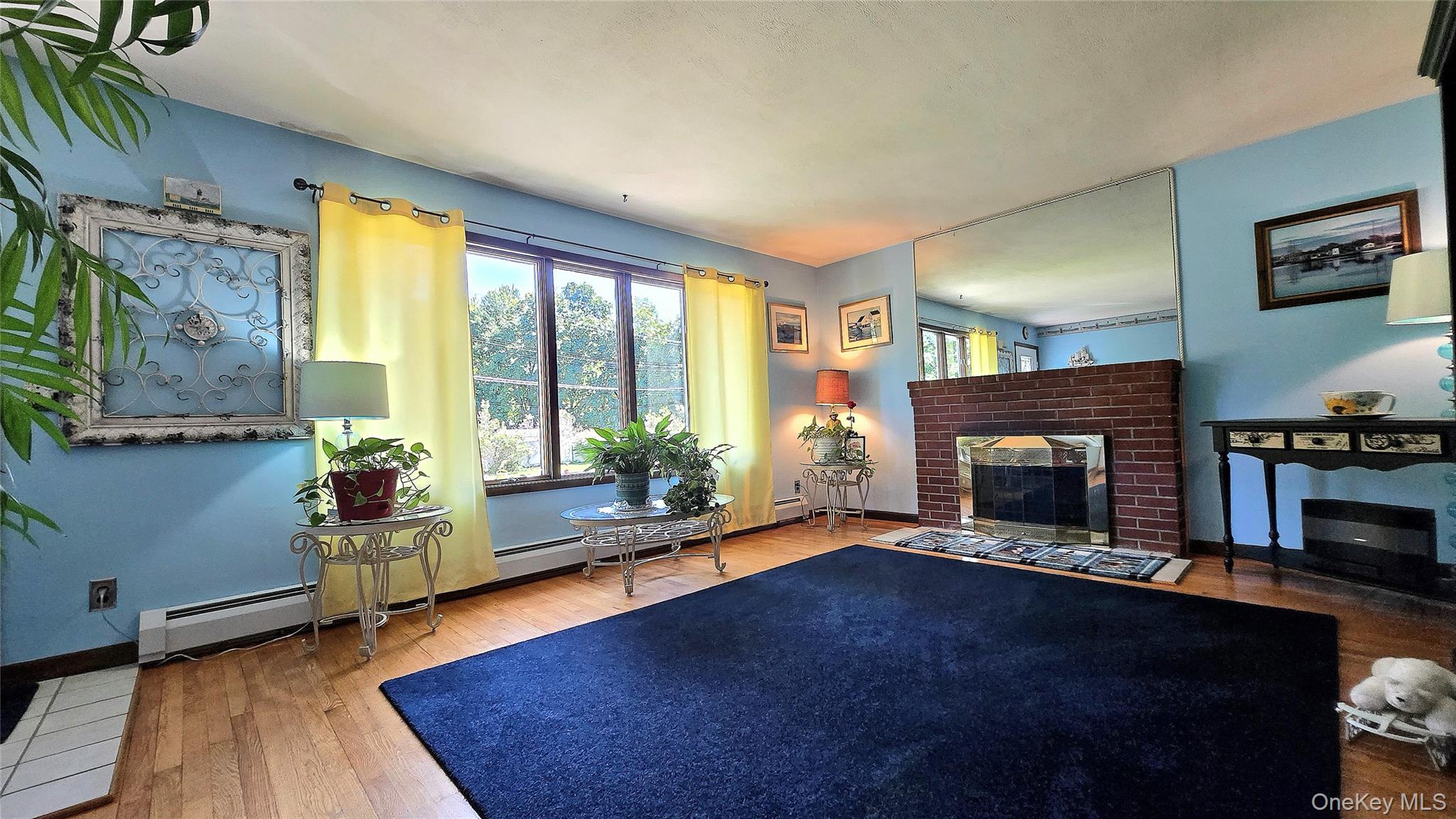 29 Kinry Road Poughkeepsie, NY 12603 - Photo 9 of 29 Living Room with Fireplace and Hardwood Floors