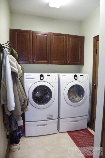 1459 Pine Ridge Road Beech Mountain, NC 28604 - Photo 20 of 25 a utility room with dryer and washer