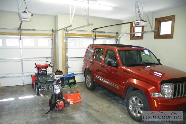 1459 Pine Ridge Road Beech Mountain, NC 28604 - Photo 4 of 25 a car parked in garage