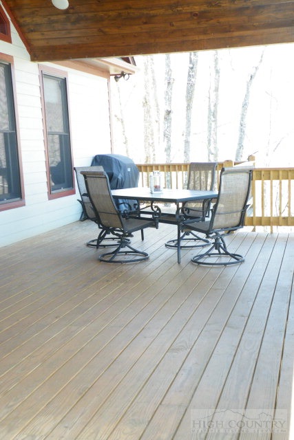 1459 Pine Ridge Road Beech Mountain, NC 28604 - Photo 5 of 25 a view of a terrace with outdoor seating