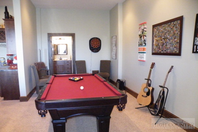 1459 Pine Ridge Road Beech Mountain, NC 28604 - Photo 7 of 25 a room with furniture pool table and windows