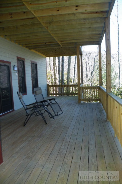 1459 Pine Ridge Road Beech Mountain, NC 28604 - Photo 10 of 25 a view of a patio with wooden floor