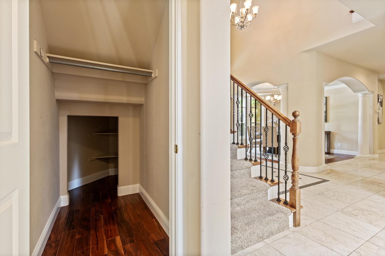 9003 Cedar Ridge Drive Granite Bay, CA 95746 - Photo 24 of 65 a view of a hallway with wooden floor and staircase
