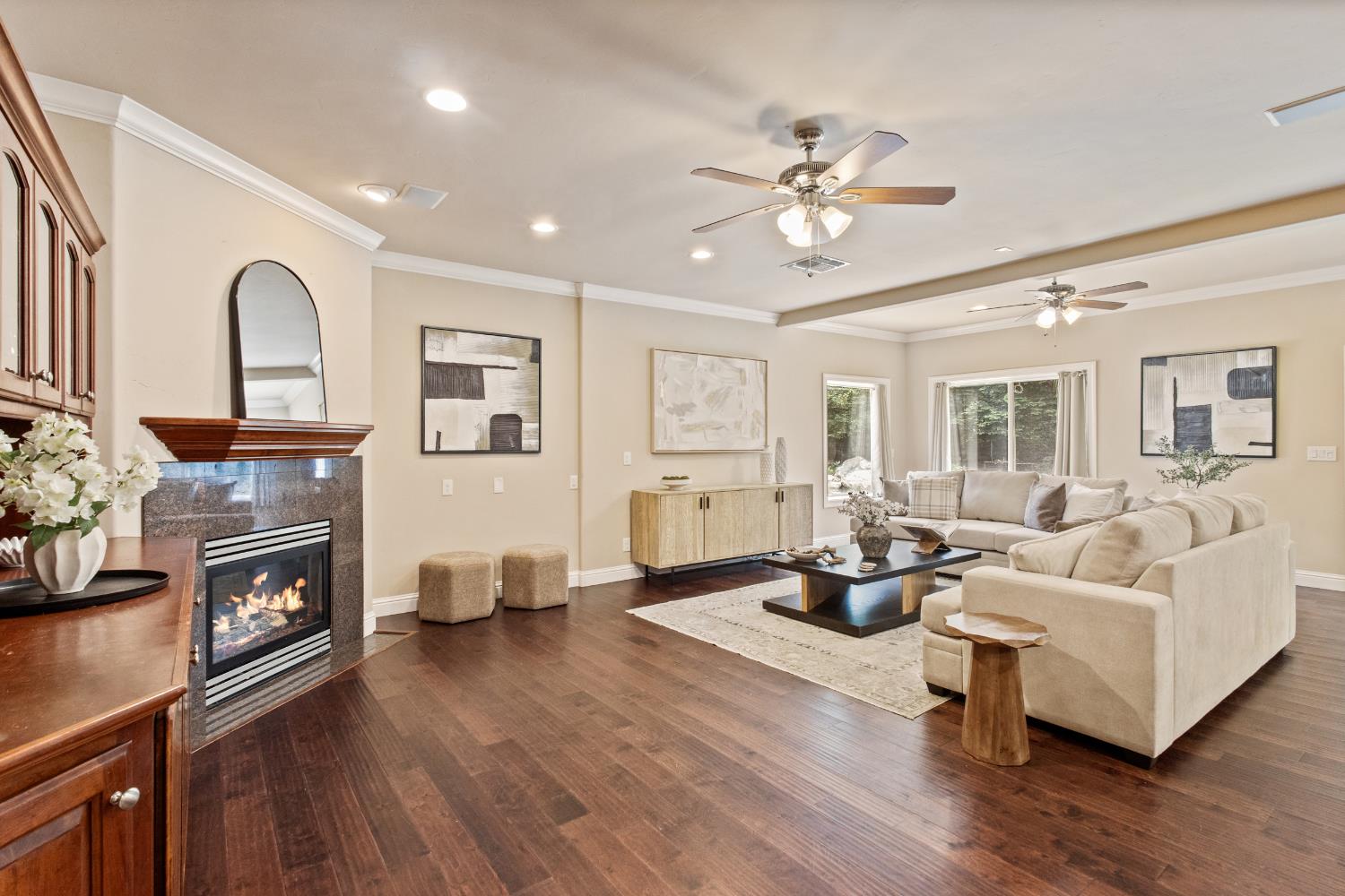 9003 Cedar Ridge Drive Granite Bay, CA 95746 - Photo 26 of 65 a living room with fireplace furniture and a wooden floor