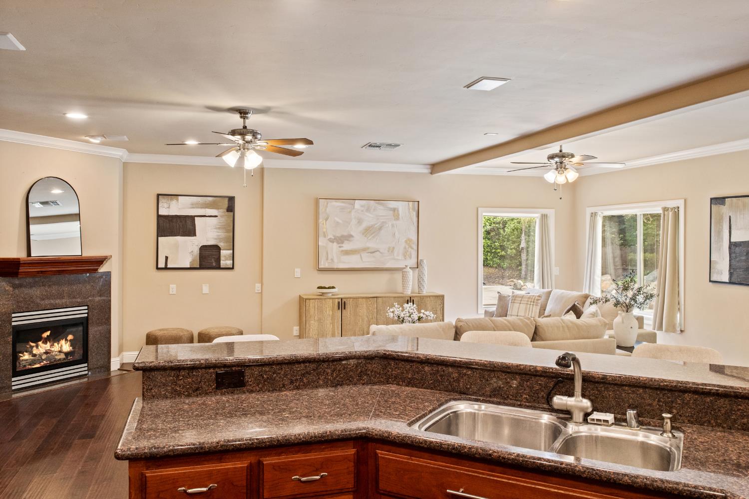 9003 Cedar Ridge Drive Granite Bay, CA 95746 - Photo 30 of 65 a living room with granite countertop furniture and fireplace