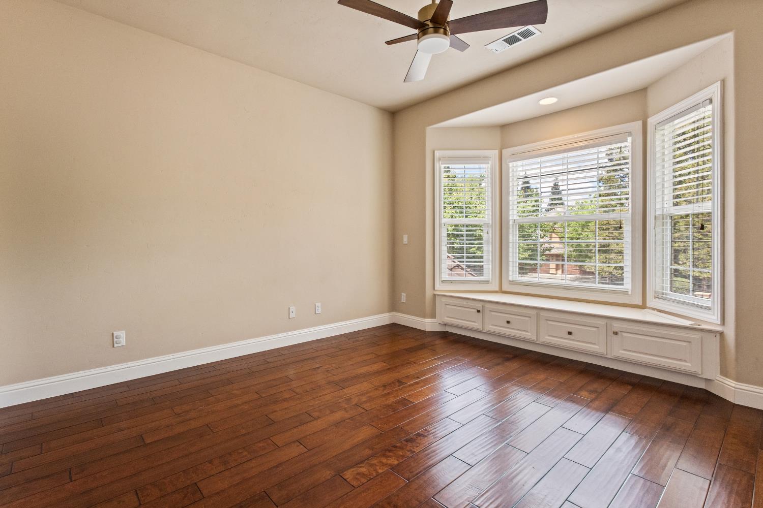 9003 Cedar Ridge Drive Granite Bay, CA 95746 - Photo 47 of 65 a view of a livingroom with wooden floor and a window
