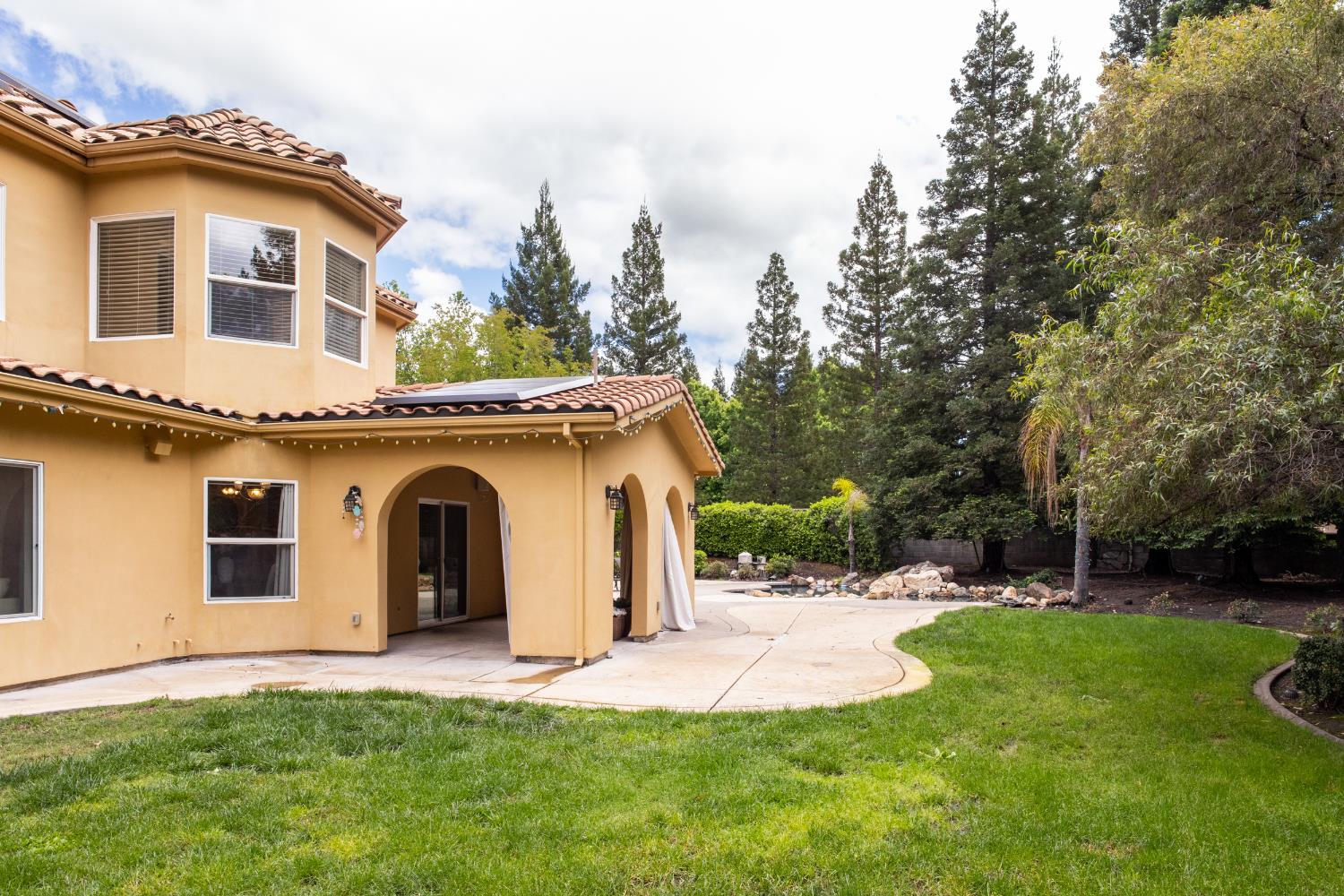 9003 Cedar Ridge Drive Granite Bay, CA 95746 - Photo 59 of 65 a view of a yard in front of a house