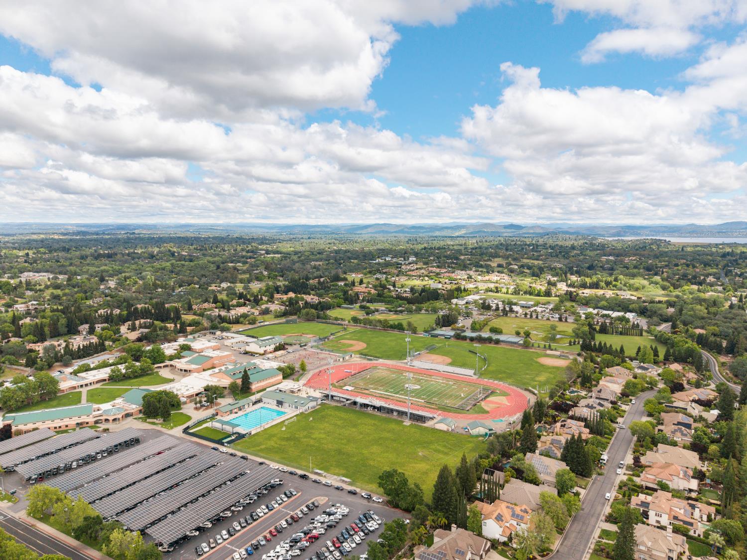 9003 Cedar Ridge Drive Granite Bay, CA 95746 - Photo 65 of 65 an aerial view of residential houses with outdoor space
