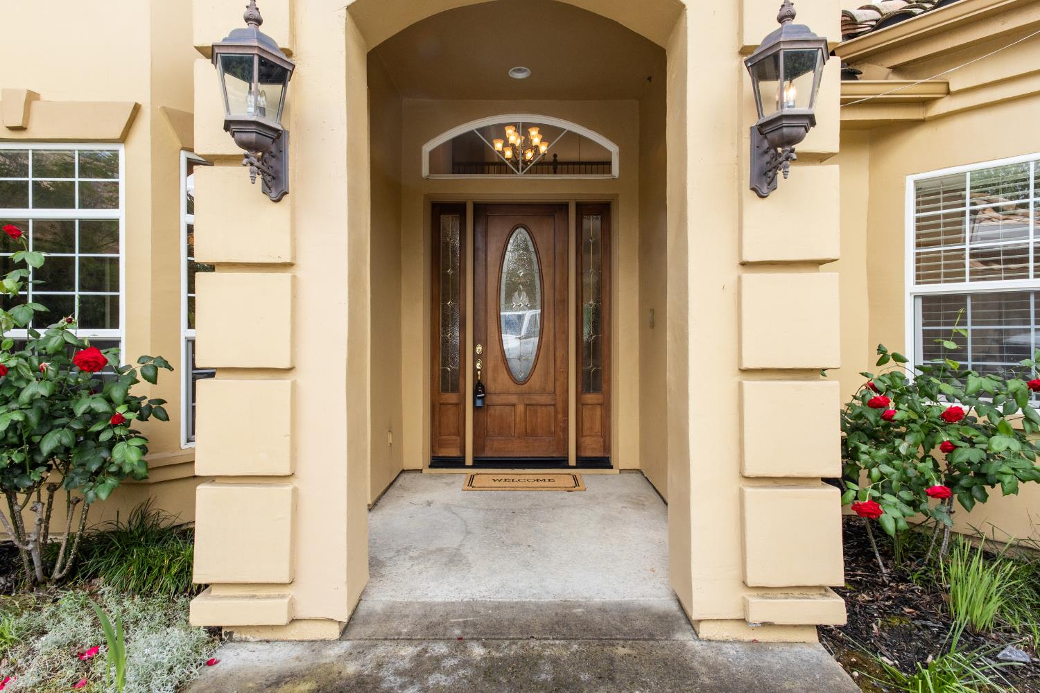 9003 Cedar Ridge Drive Granite Bay, CA 95746 - Photo 7 of 65 a vase with flowers sitting on a floor in front of a door
