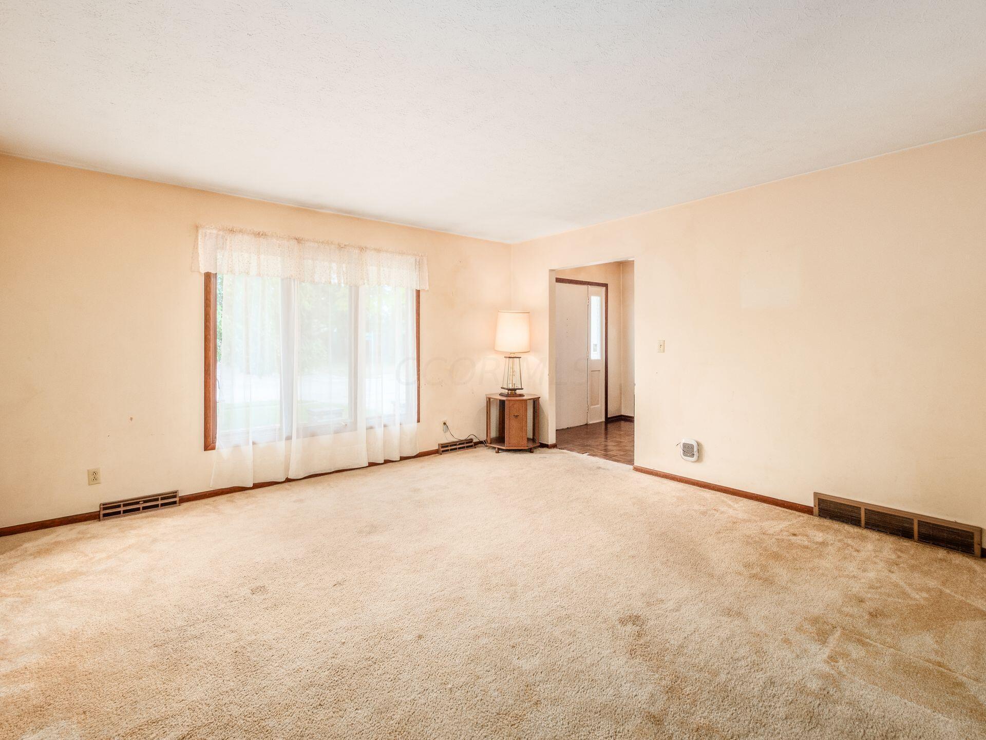 1891 Fairhaven Road Columbus, OH 43229 - Photo 5 of 36 Living room flows into the dining room!