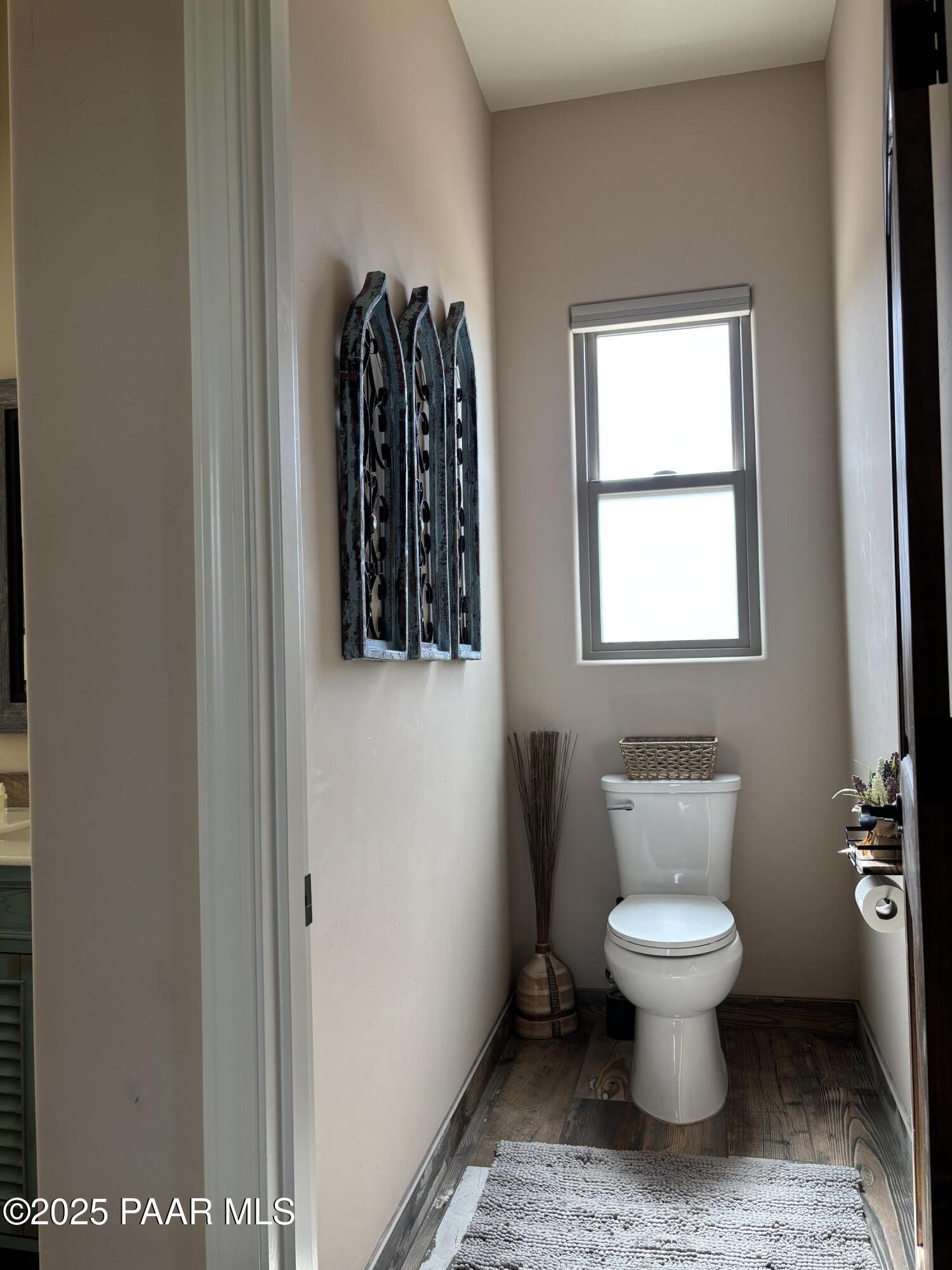 14994 North Hope Rose Road Prescott, AZ 86305 - Photo 14 of 33 a bathroom with a toilet and a window