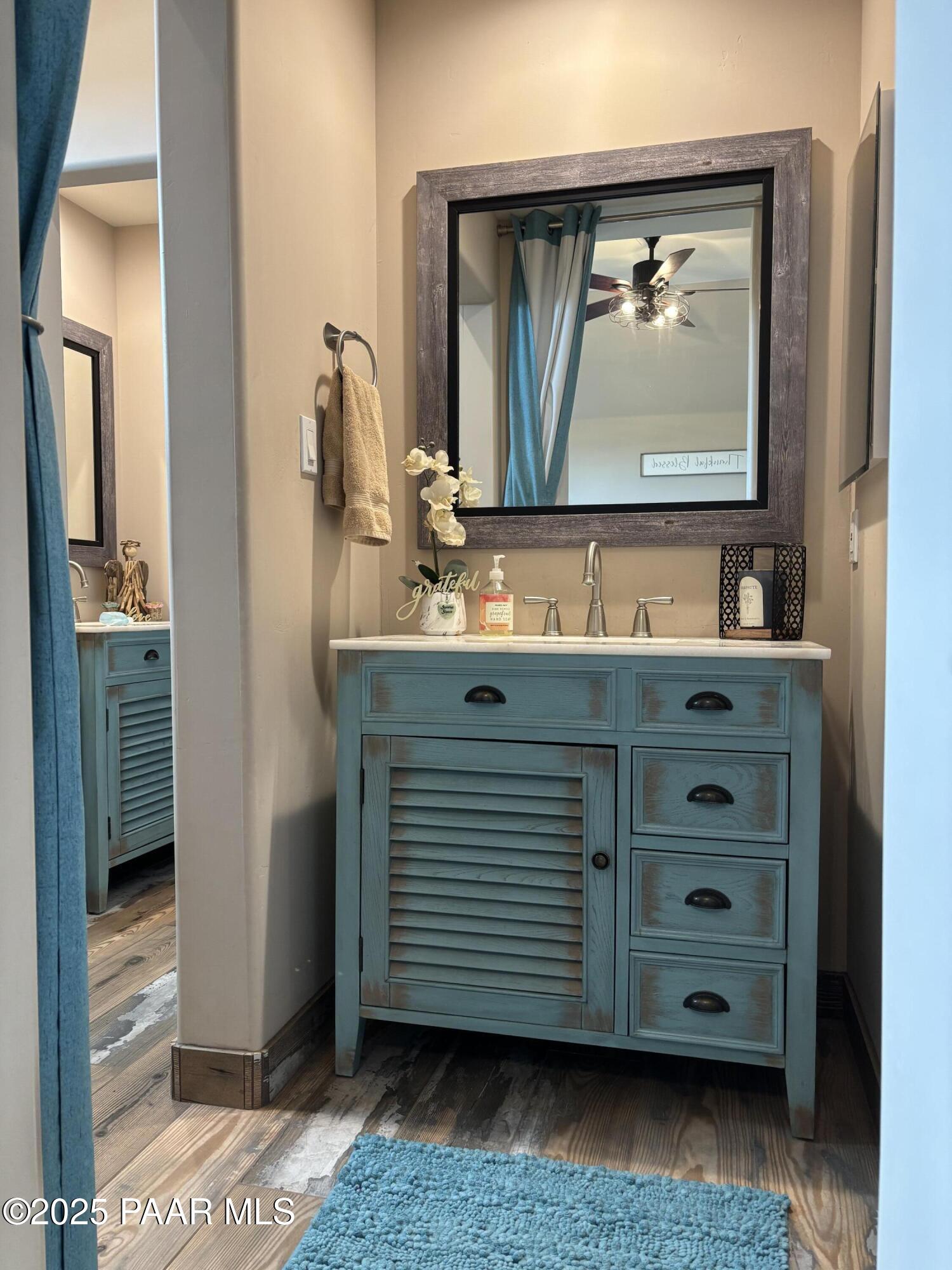 14994 North Hope Rose Road Prescott, AZ 86305 - Photo 17 of 33 a bathroom with a sink and a mirror
