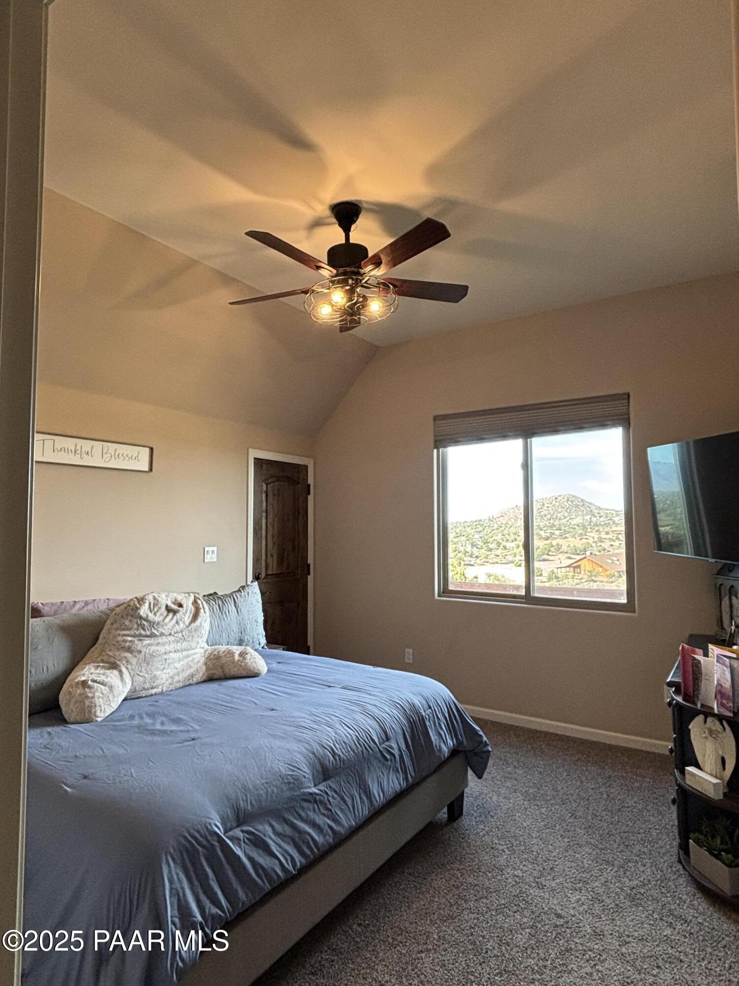 14994 North Hope Rose Road Prescott, AZ 86305 - Photo 21 of 33 a bedroom with a bed and window