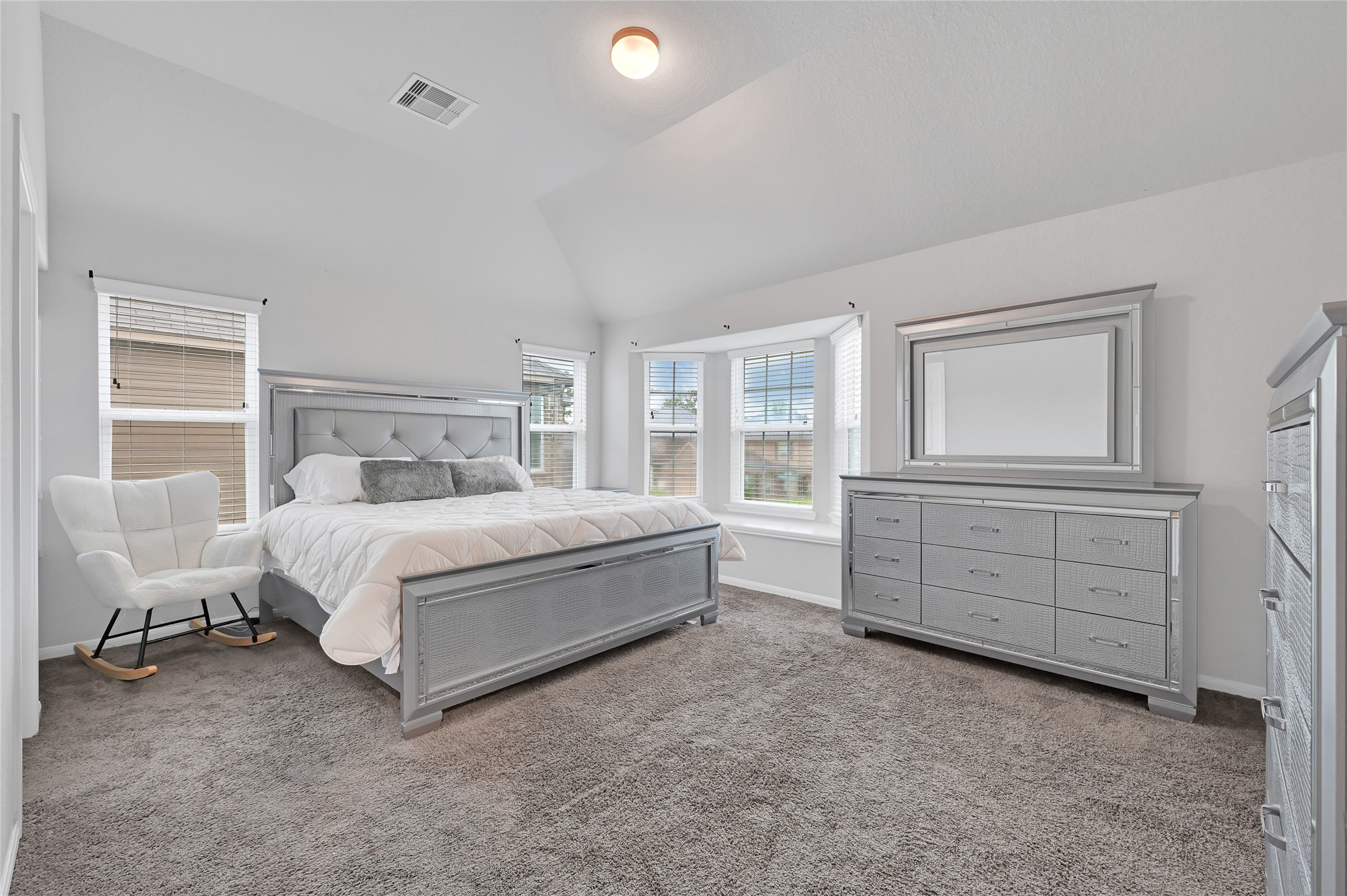 11346 Cascading Stream Way Houston, TX 77044 - Photo 12 of 24 a bedroom with a bed and a window